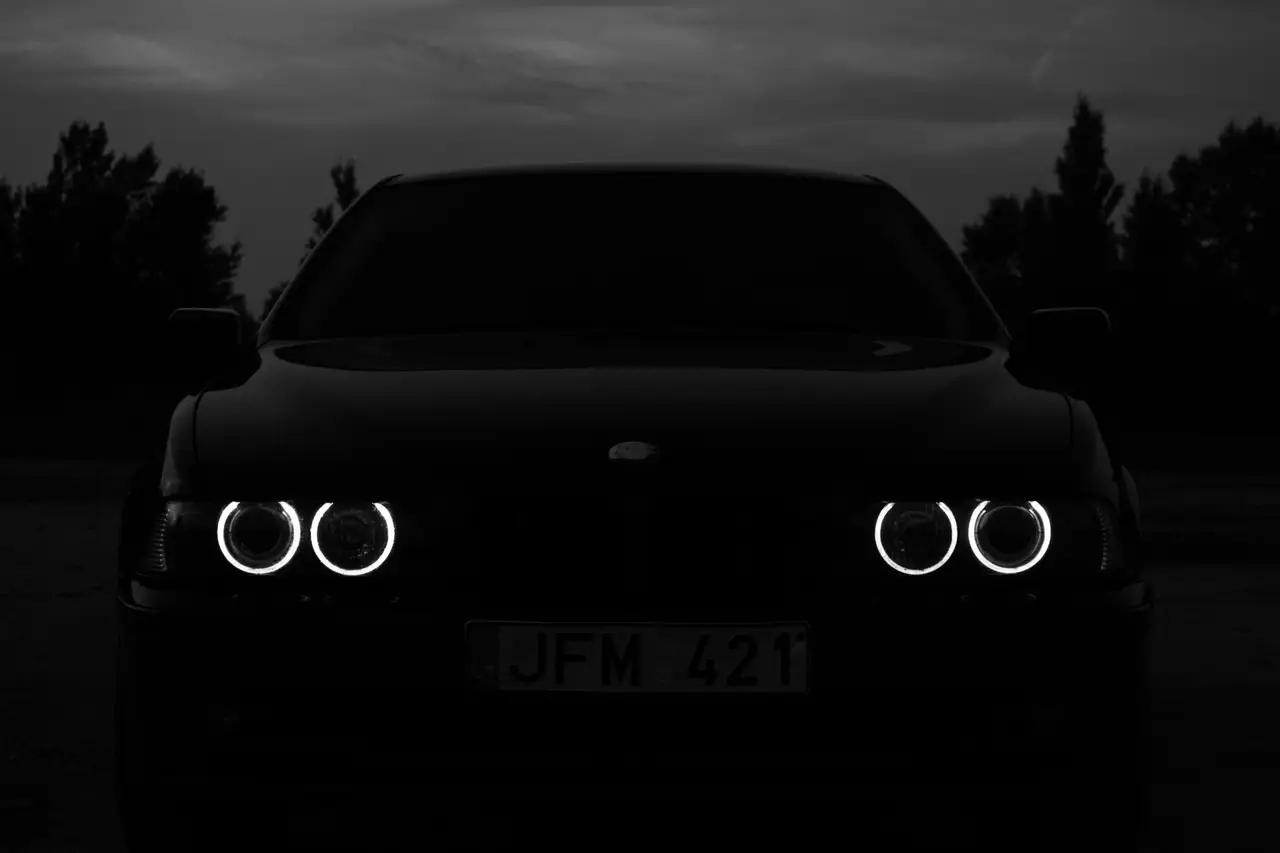 Dark performance saloon with illuminated halo headlights